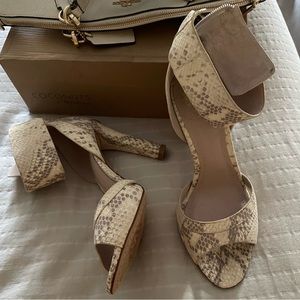 Vince Camuto brand new size 8 snakeskin heels never worn.